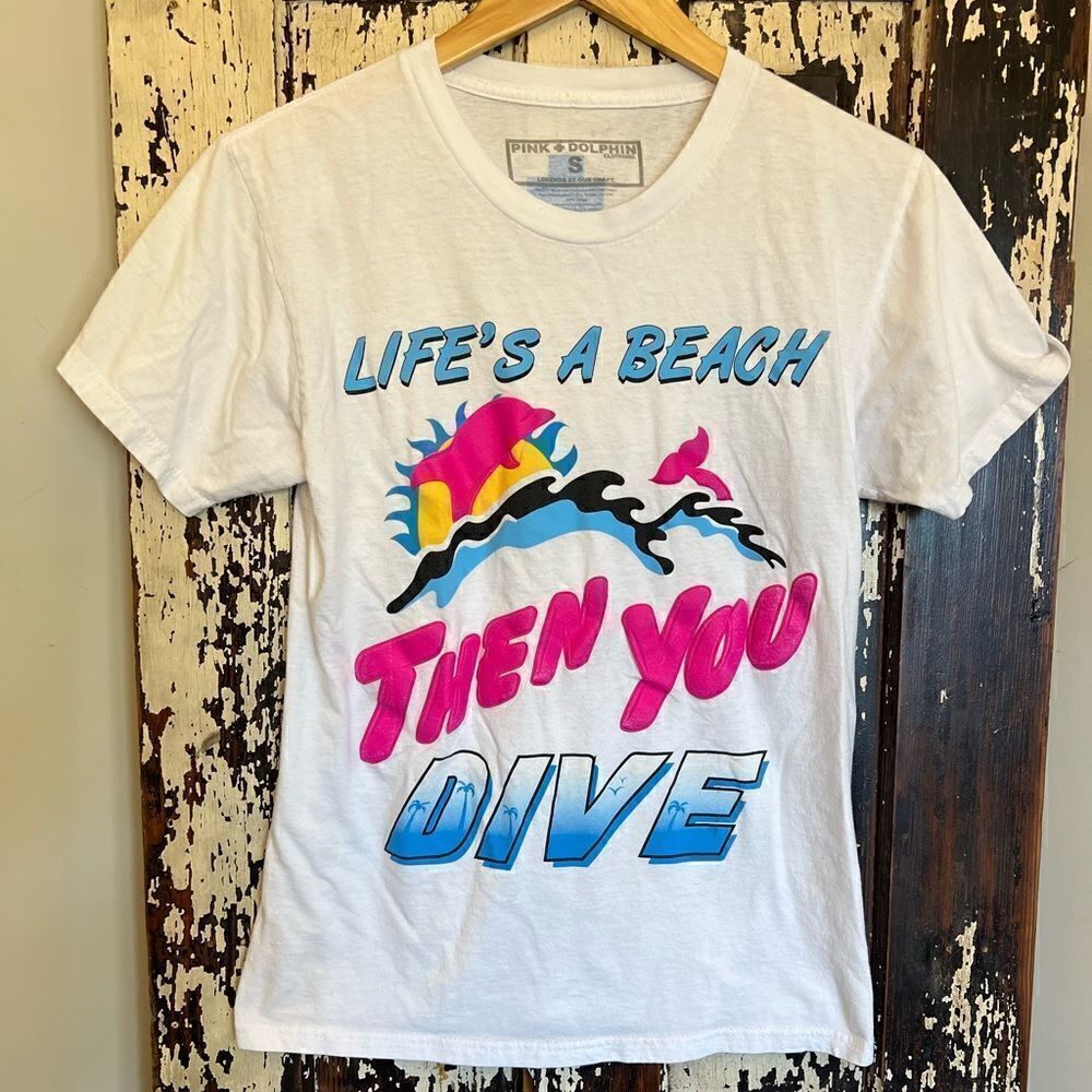 Unisex Pink Dolphin Life’s A Beach size Small T-shirt.